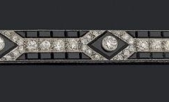 MAUBOUSSIN -  Bracelet Onyx Diamants - Vers 1925 - Adjugé : 35.000€